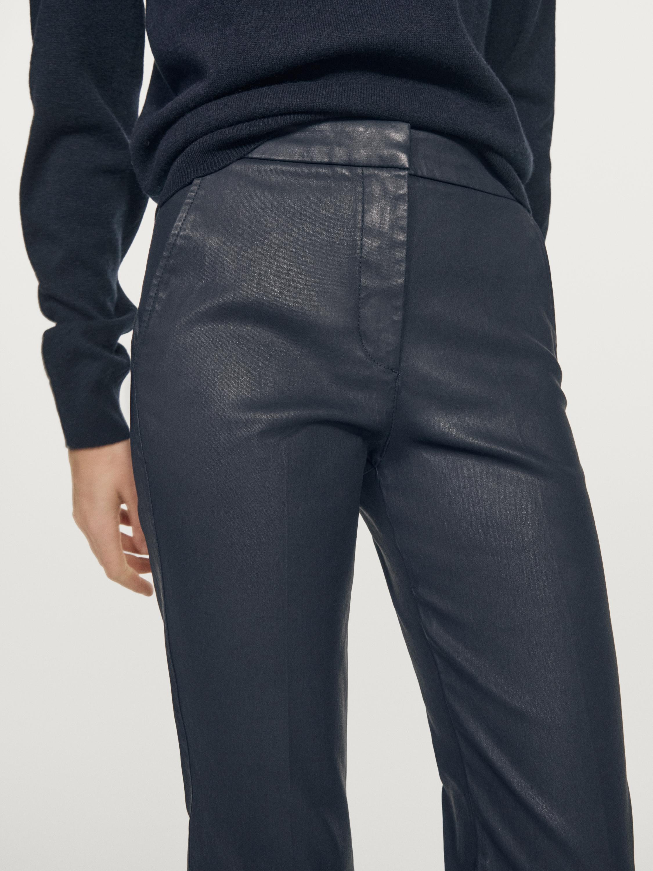 Waxed flare fit trousers